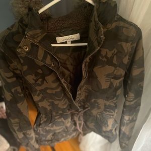 Junior camouflaged jacket
